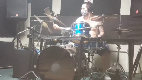 playing drums for wear a mask