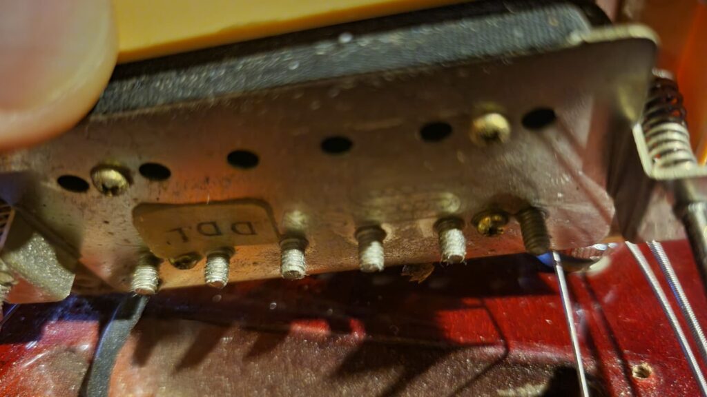 back of a Seymour Duncan distortion bridge humbucker pickup