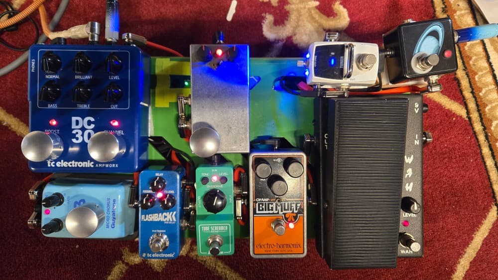 a photograph of a pedalboard with settings used for online demos